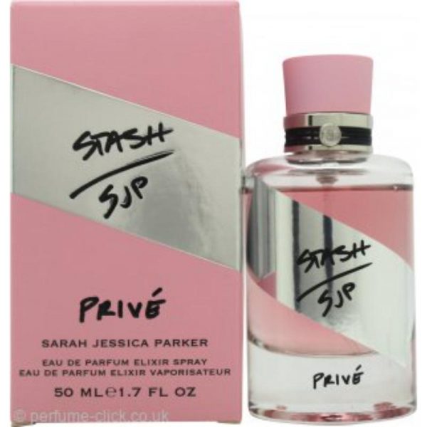 a bottle of perfume in a pink box